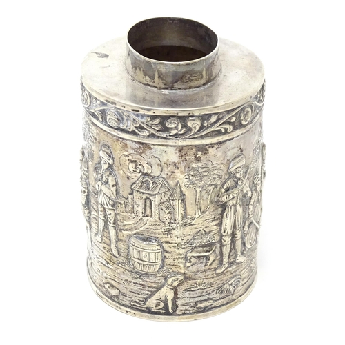 470 - A Continental silver caddy with embossed decoration depicting musicians, figures imbibing, dancing, ... 