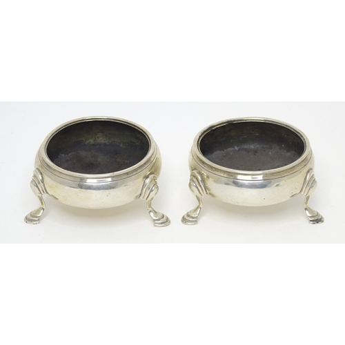 482 - A pair of Geo III silver salts, each raised on three hoof feet, hallmarked London 1769, maker IS & A... 