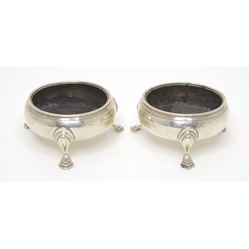 482 - A pair of Geo III silver salts, each raised on three hoof feet, hallmarked London 1769, maker IS & A... 