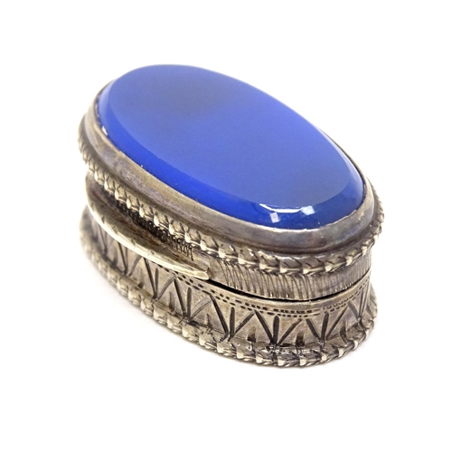 483 - A Continental .800 silver pill box with inset blue detail to top. Approx. 1 1/4