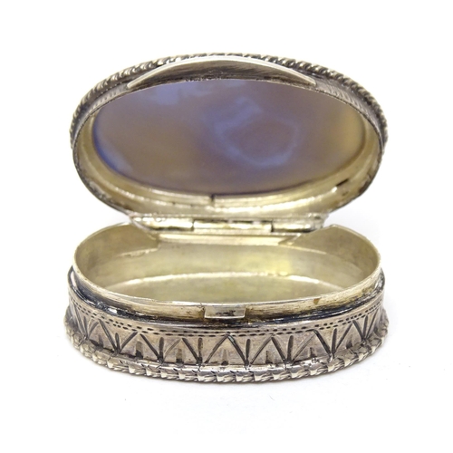 483 - A Continental .800 silver pill box with inset blue detail to top. Approx. 1 1/4