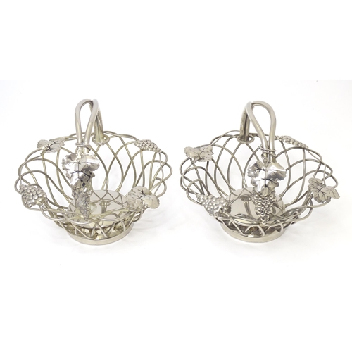 543 - A quantity of assorted silver plated items to include a crumb scoop, openwork baskets with fruiting ... 