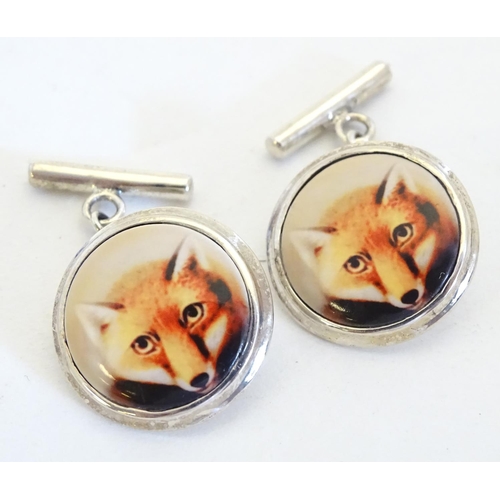 663 - Silver cufflinks with cabochon detail with fox head decoration. Approx. 3/4