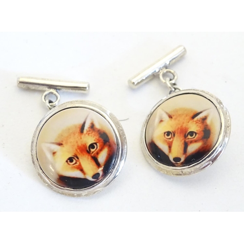 663 - Silver cufflinks with cabochon detail with fox head decoration. Approx. 3/4