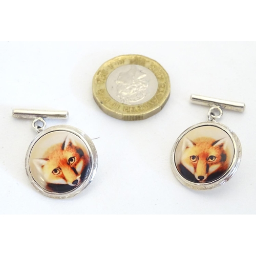 663 - Silver cufflinks with cabochon detail with fox head decoration. Approx. 3/4