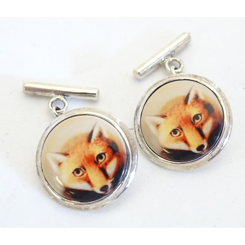 663 - Silver cufflinks with cabochon detail with fox head decoration. Approx. 3/4