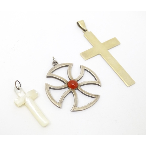 744 - Six assorted cross formed pendants to include silver and white examples, one hallmarked Birmingham 1... 