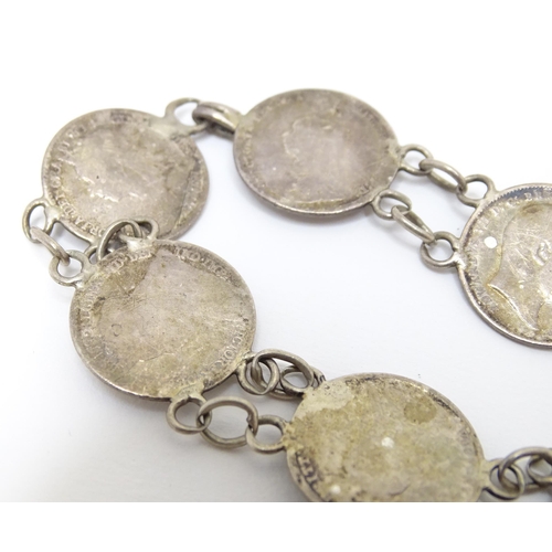 745 - A silver and white metal bracelet set with Victorian and later 3 pence coins. Together with a silver... 