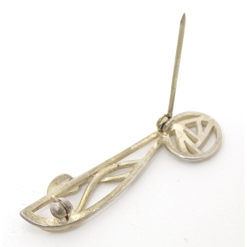 749 - A silver brooch inspired by the work of Charles Rennie mackintosh. Hallmarked Edinburgh 1993 maker C... 