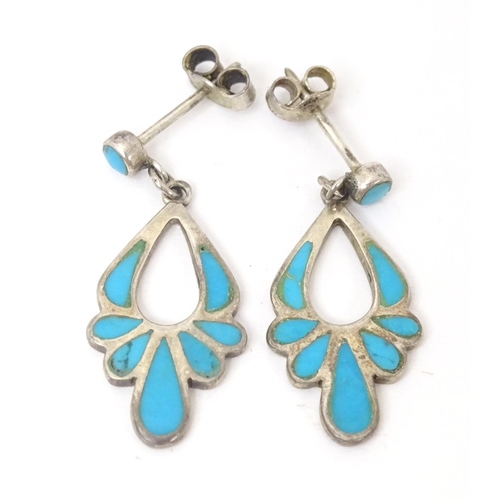 755 - A silver ring set with turquoise detail, together with drop earrings. Ring size approx. M 1/2. (2+1)