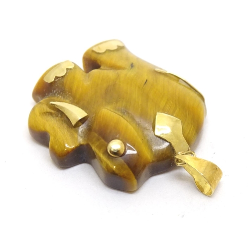 757 - A tigers eye pendant modelled as an elephant with 9ct gold mounts 1