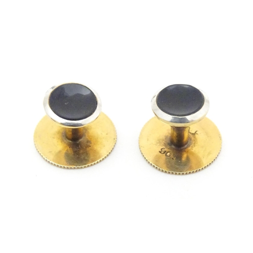 762 - A pair of 9ct gold cufflinks together with a pair of collar studs.