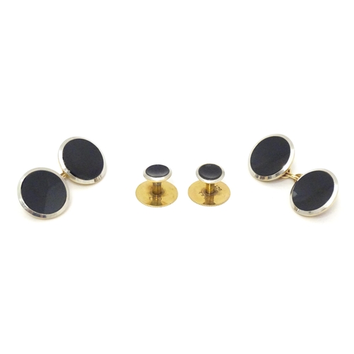 762 - A pair of 9ct gold cufflinks together with a pair of collar studs.