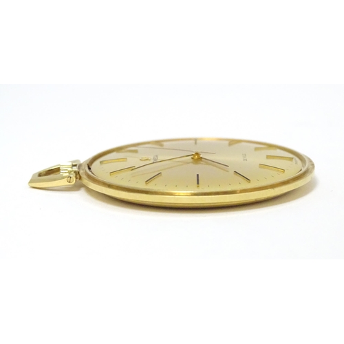 775 - An Omega de Ville gold plated pocket watch with round gilt dial and applied baton markers. Approx. 1... 