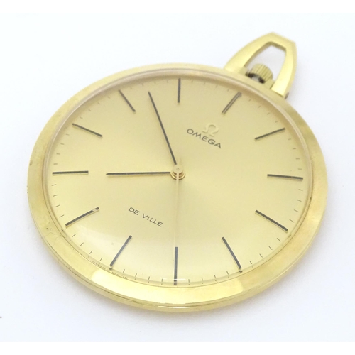 775 - An Omega de Ville gold plated pocket watch with round gilt dial and applied baton markers. Approx. 1... 