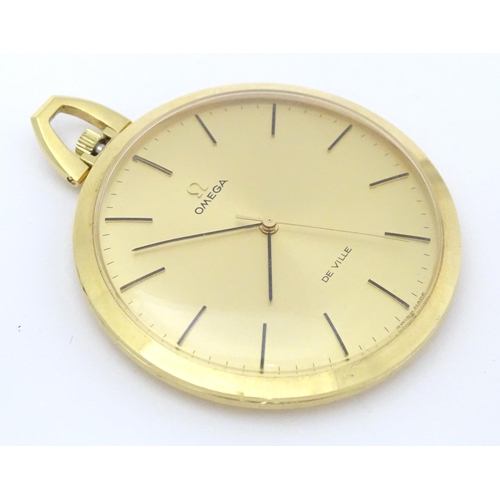 775 - An Omega de Ville gold plated pocket watch with round gilt dial and applied baton markers. Approx. 1... 