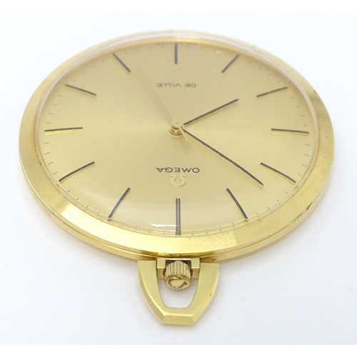 775 - An Omega de Ville gold plated pocket watch with round gilt dial and applied baton markers. Approx. 1... 