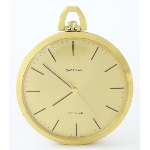 775 - An Omega de Ville gold plated pocket watch with round gilt dial and applied baton markers. Approx. 1... 