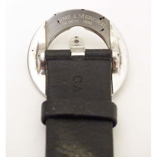 787 - A Baume & Mercier Vice Versa quartz wrist watch, the case signed and numbered having a black leather... 