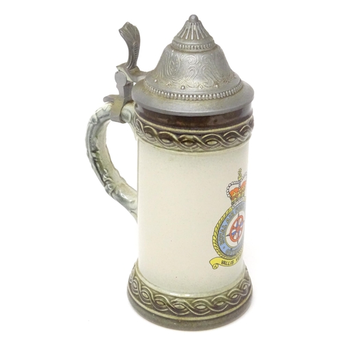 813 - Militaria : a mid 20thC stein tankard, decorated with the insignia of RAF Gütersloh (HQ No.2 Group R... 