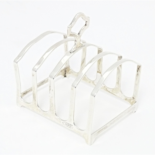 245 - A silver five bar toast rack, hallmarked Sheffield 1922, maker Brook & Son. Approx. 3