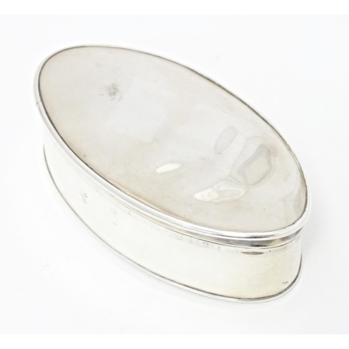 247 - A Continental white metal snuff box of oval form with gilded interior. Indistinctly marked. Approx. ... 