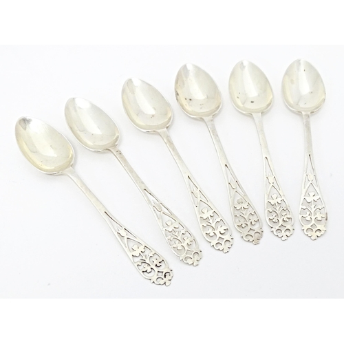 252 - Six silver tea spoons with fretwork decoration to handles, hallmarked Birmingham 1919, maker William... 