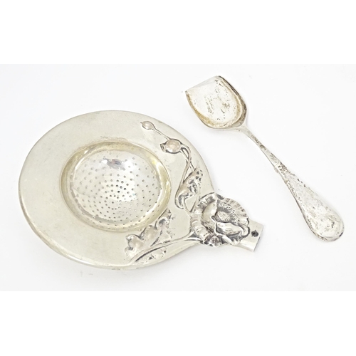 257 - A Continental .800 silver shovel formed spoon with Art Nouveau floral decoration to reverse of handl... 