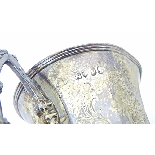 241 - A Victorian silver jug of octagonal form with engraved decoration and Gothic Revival handle, hallmar... 