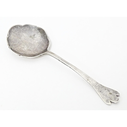 250 - A silver jam / preserve spoon with trefid hand and rats tail bowl, hallmarked Sheffield 1933, maker ... 