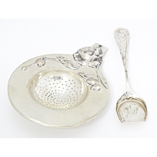 257 - A Continental .800 silver shovel formed spoon with Art Nouveau floral decoration to reverse of handl... 