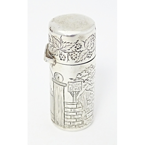 260 - A Victorian silver scent / perfume jar with engraved novelty scene to body depicting two children sc... 