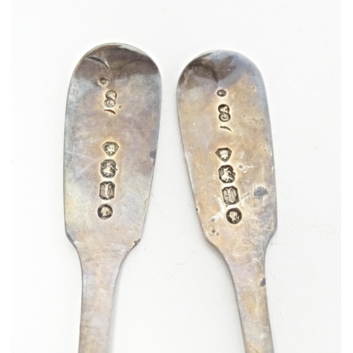 279 - A pair of Victorian Fiddle pattern salt spoons hallmarked London 1866, maker Chawner & Co. Together ... 