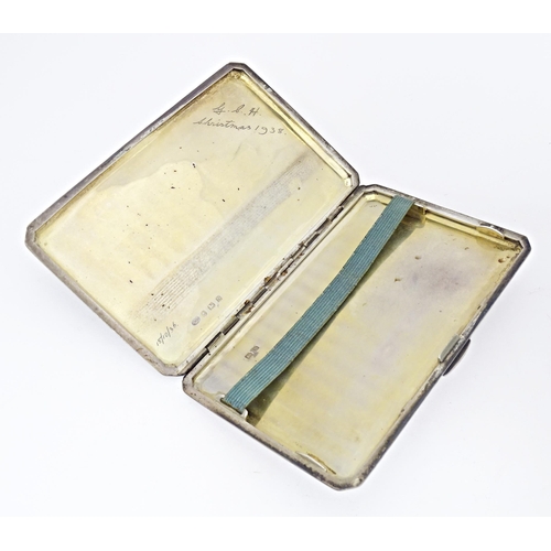 283 - An Art Deco silver cigarette case with engine turned decoration, hallmarked Birmingham 1937, maker A... 