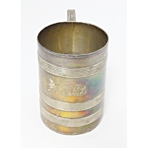 292 - A Geo III silver tankard with banded decoration and loop handle hallmarked London 1790, maker Henry ... 