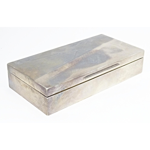 298 - An Art Deco silver table top cigarette box hallmarked London 1944, maker Goldsmiths & Silversmiths C... 