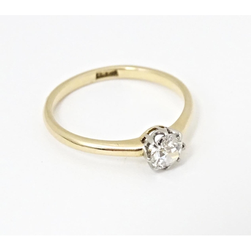 588 - An 18ct diamond solitaire ring. Diamond approx. 4mm. Ring size approx. L 1/2