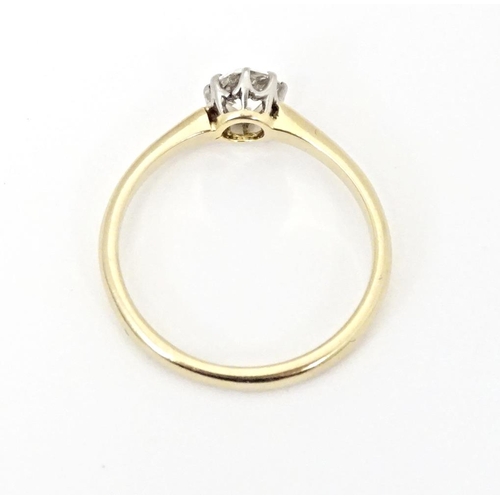 588 - An 18ct diamond solitaire ring. Diamond approx. 4mm. Ring size approx. L 1/2