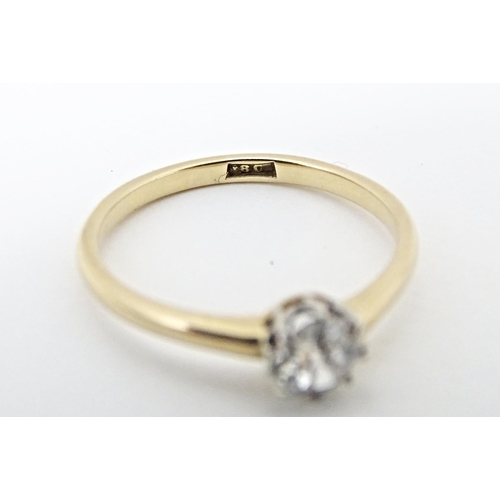 588 - An 18ct diamond solitaire ring. Diamond approx. 4mm. Ring size approx. L 1/2