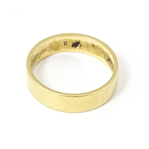 601 - An 18ct gold ring. Ring size approx. K 1/2