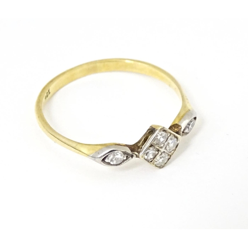 603 - A gold ring set with diamonds, marked 8ct. Ring size approx. Q