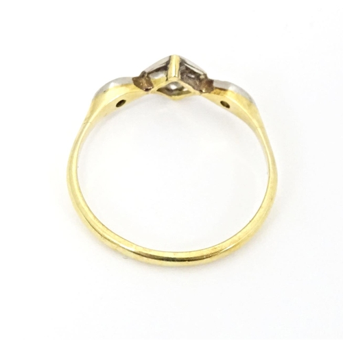 603 - A gold ring set with diamonds, marked 8ct. Ring size approx. Q