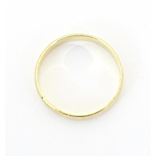 604 - A 18ct gold ring. Ring size approx. U