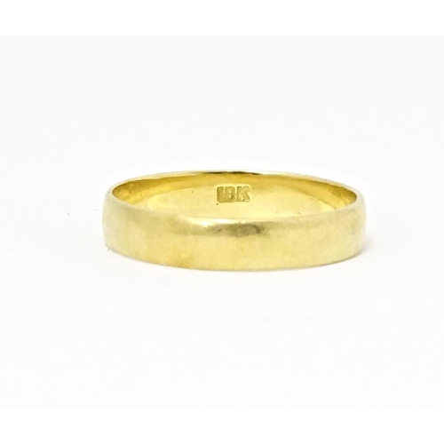 604 - A 18ct gold ring. Ring size approx. U