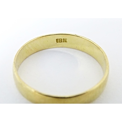 604 - A 18ct gold ring. Ring size approx. U