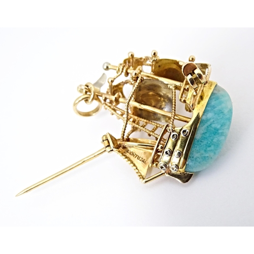 628 - An 18ct gold pendant / brooch formed as a three mast sailing ship set with green amazonite style sto... 