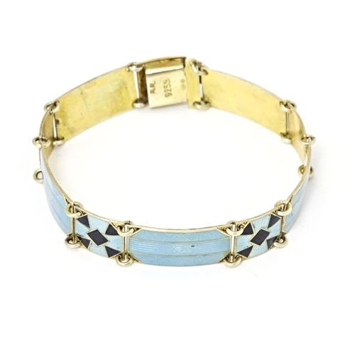 633 - Scandinavian jewellery: A Swedish silver gilt bracelet with pale blue and black guilloche enamel dec... 