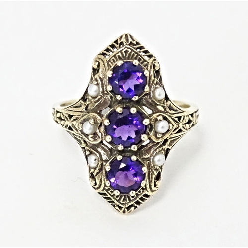 569 - A 9ct gold ring set with amethysts and seed pearls. Ring size approx. O