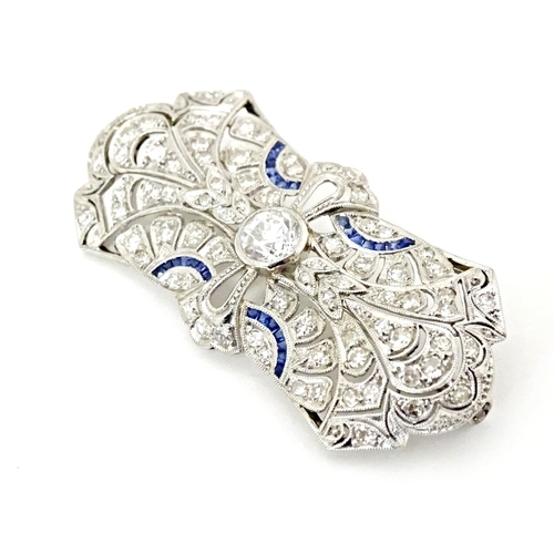 638 - An impressive diamond and sapphire Belle Epoque brooch set with a profusion of diamonds with sapphir... 