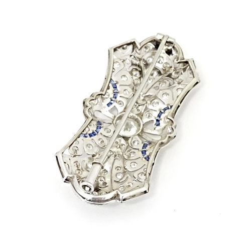 638 - An impressive diamond and sapphire Belle Epoque brooch set with a profusion of diamonds with sapphir... 